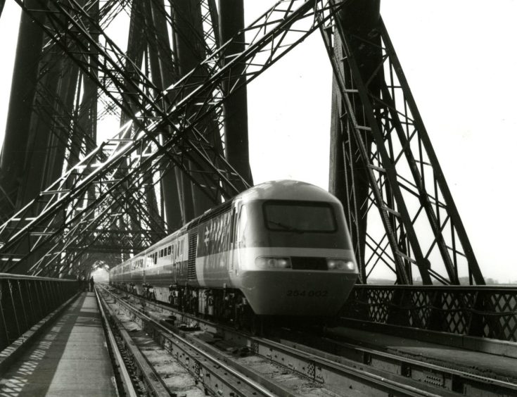 The InterCity 125 crosses the Forth Bridge on its way to Dundee in April 1978.