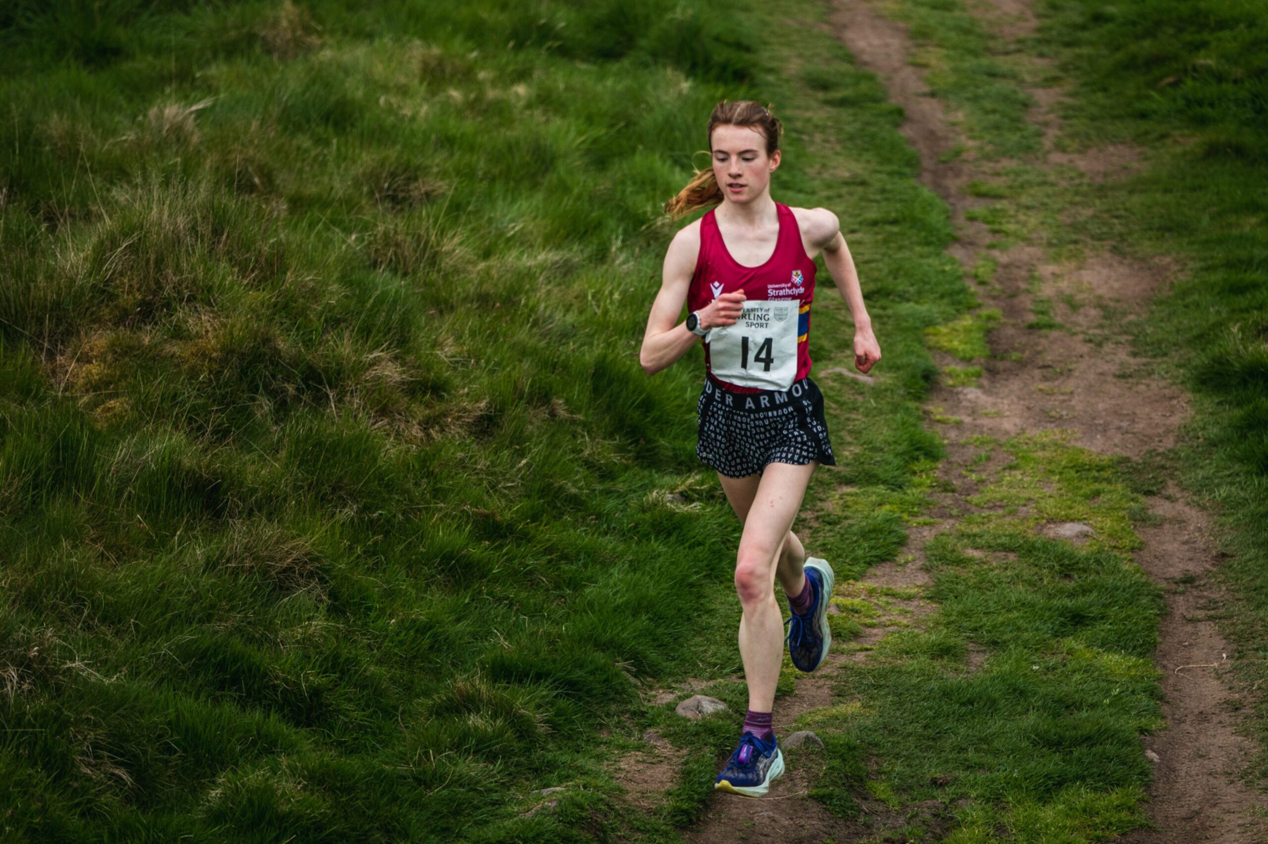 Runner Ellen Astley makes her way down a track.