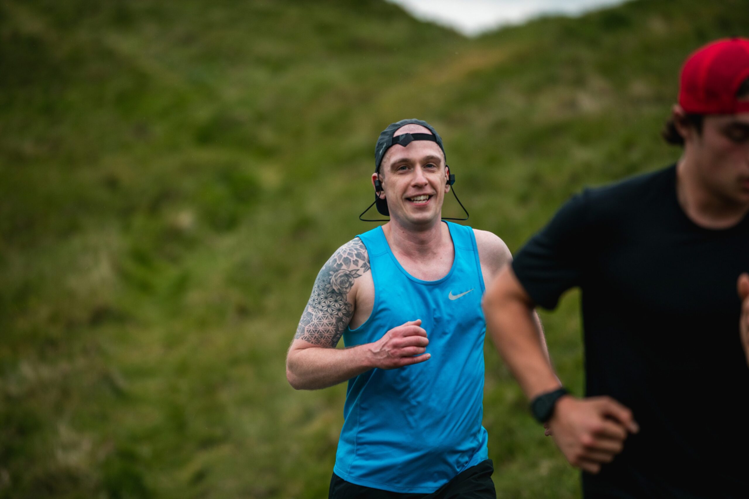 A runner with headphones in takes part in the race.