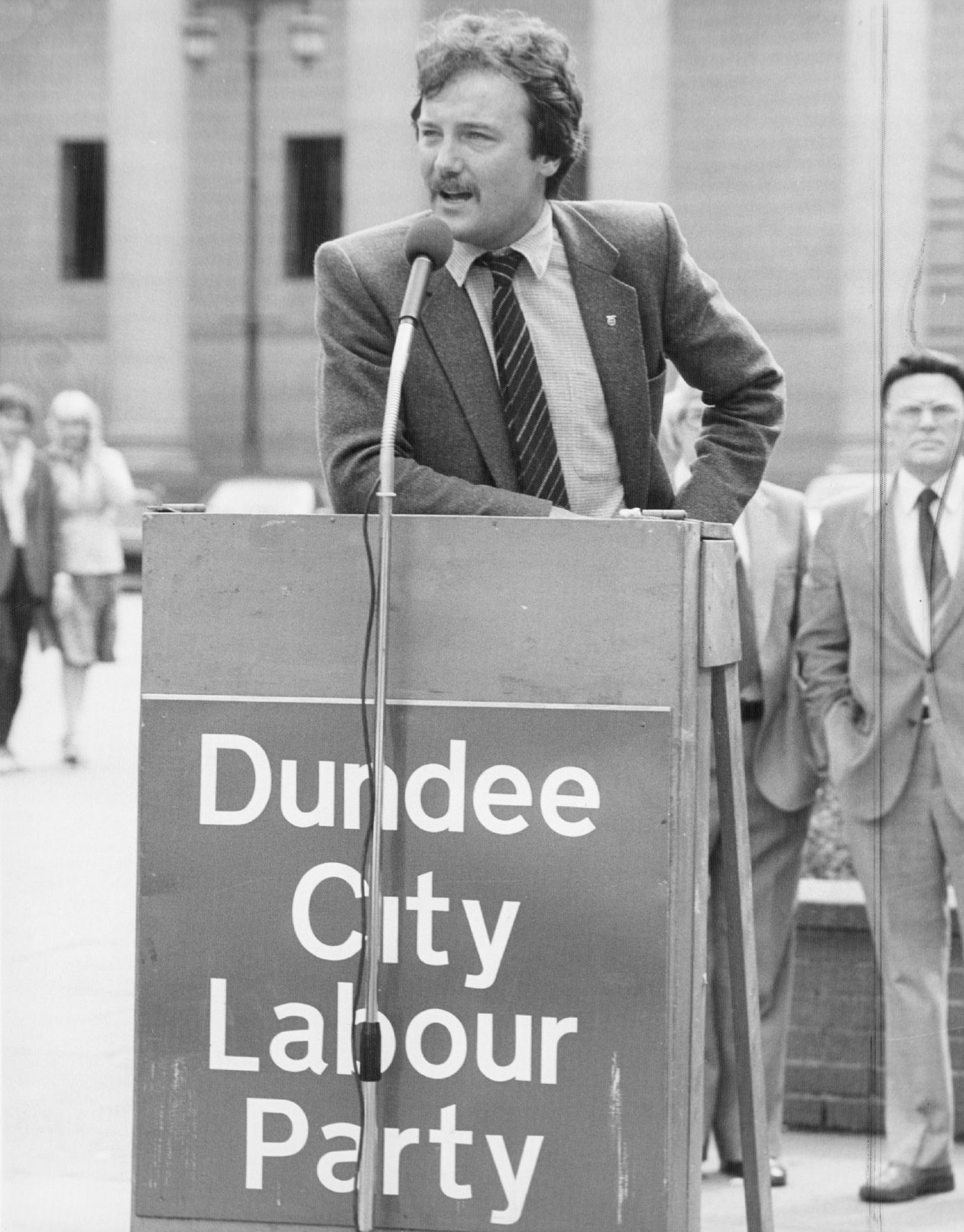George Galloway at a lectern in Dundee's City Square, promoting the twinning with Nablus.