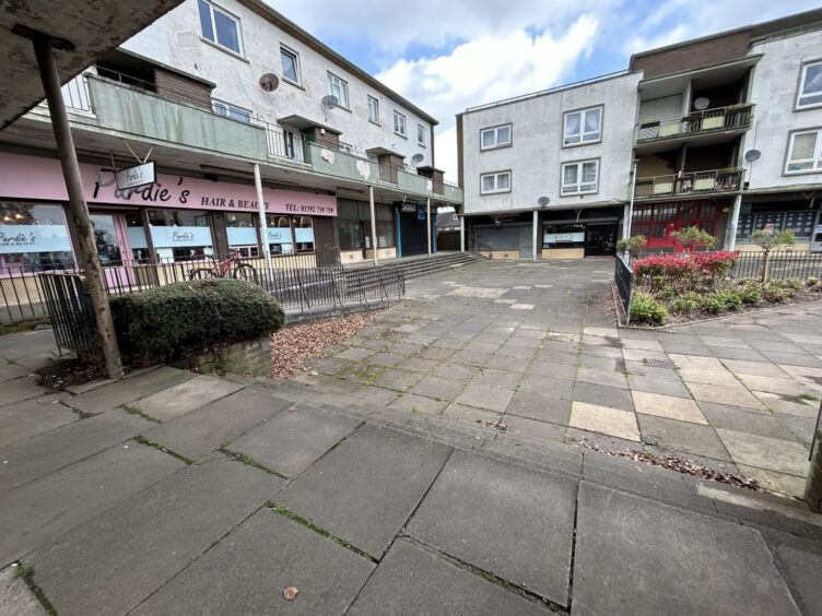 Seven shops at Woodside Shopping Precinct are included in the sale. 