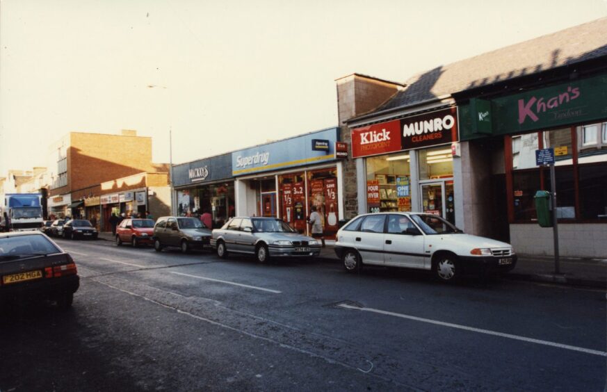 The exterior of some Brook Street shops, including Superdrug and MacKays.