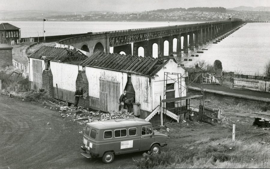 Men at work as Wormit Station is pulled down in 1981.