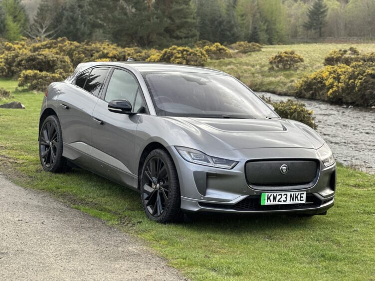 A close-up of the I-Pace, with the river in the background.