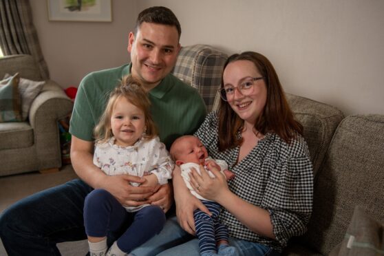 Georgia and Liam Wood with their two children Lily Mae and Oliver.