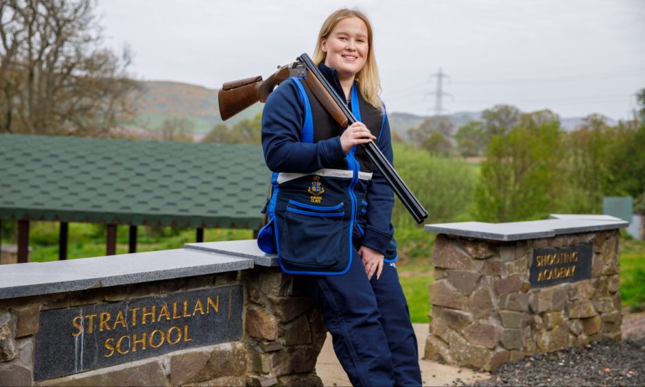 Molly with her gun at Strathallan shooting academy