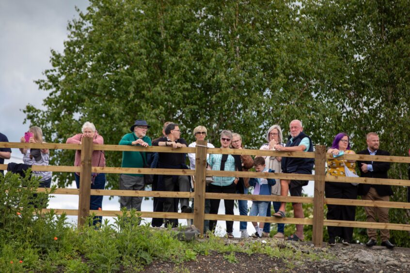 Locals watch the opening of the Levenmouth rail line.