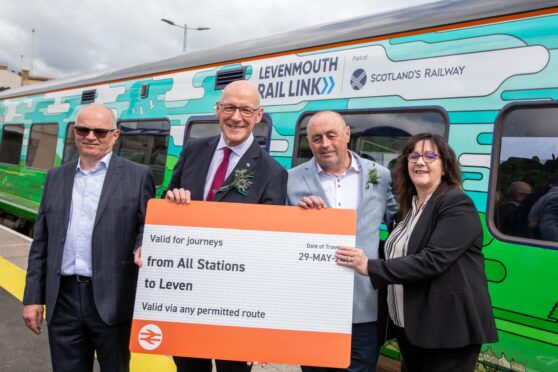 First Minister John Swinney leads the opening of the new rail link. Image: Kenny Smith/DC Thomson
