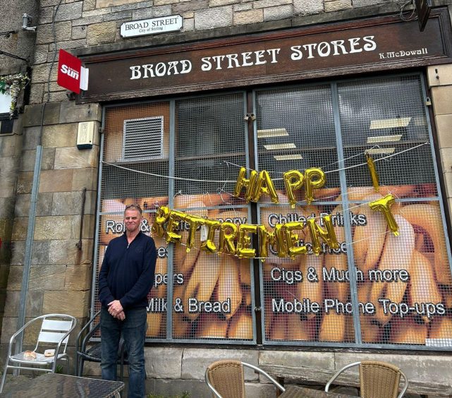 Keith outside the Stirling store on his final day