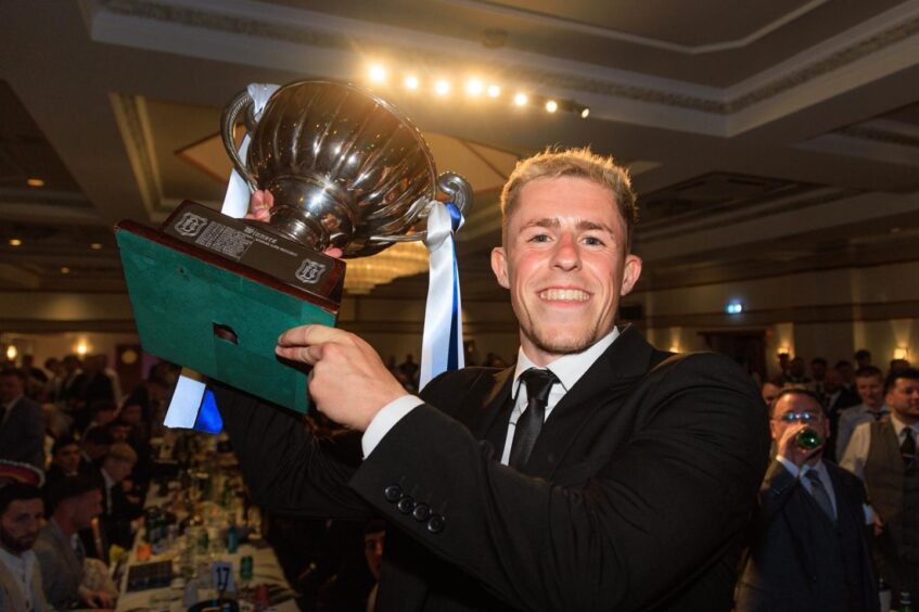 Luke McCowan with the Player of the Year trophy. Image: Dundee FC.