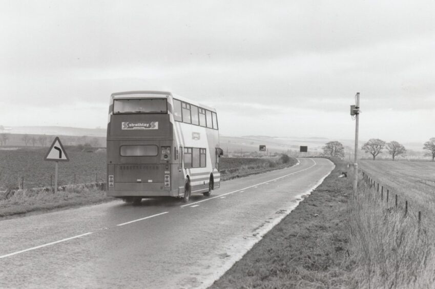 A Strathtay bus heading on the A92. 