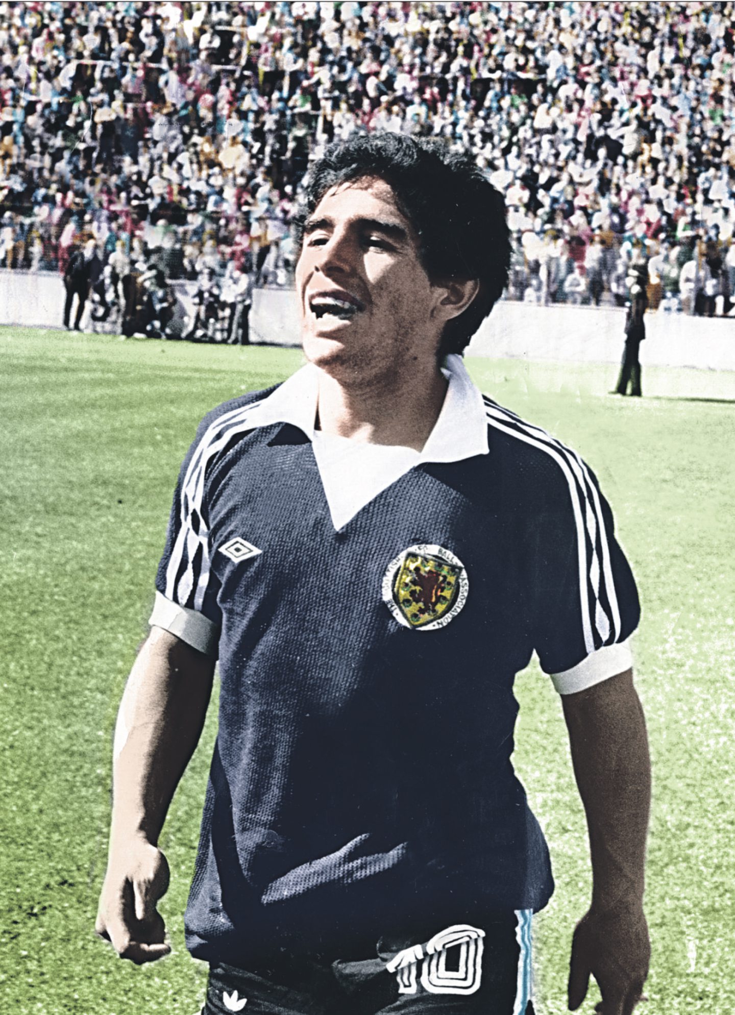 Diego walks off the park with Arthur Graham's Scotland shirt. 