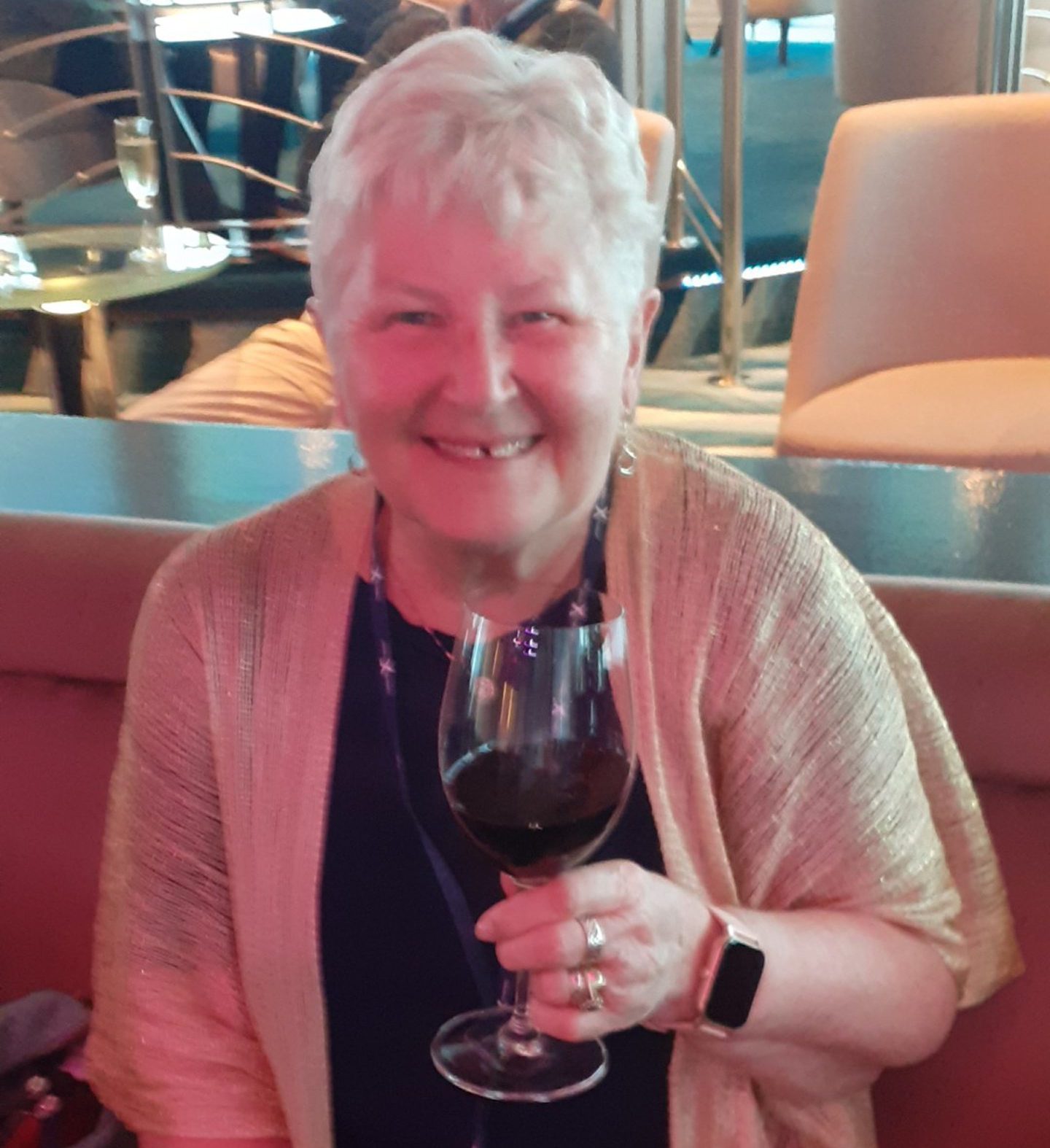Margaret enjoying a glass of red wine. 