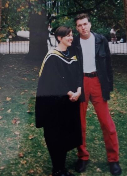 Marie graduated from Melbourne University with a social work degree. She is pictured with her then partner, Joe.