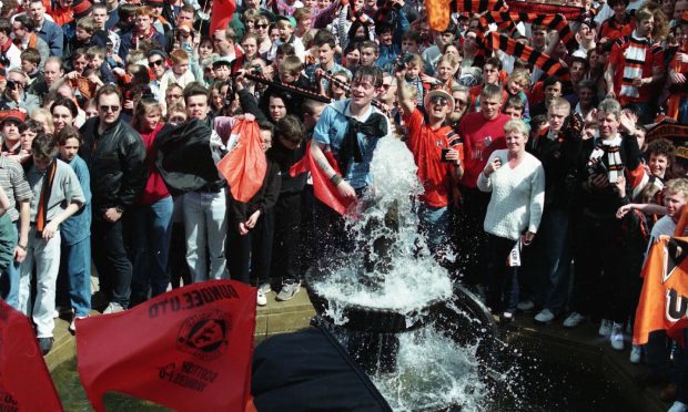 Dundee United fans enjoyed splashing in the fountains and singing.