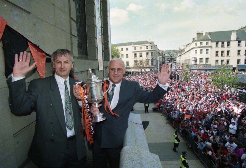 Jim McLean, right, and Ivan Golac in front of a sea of Tangerine