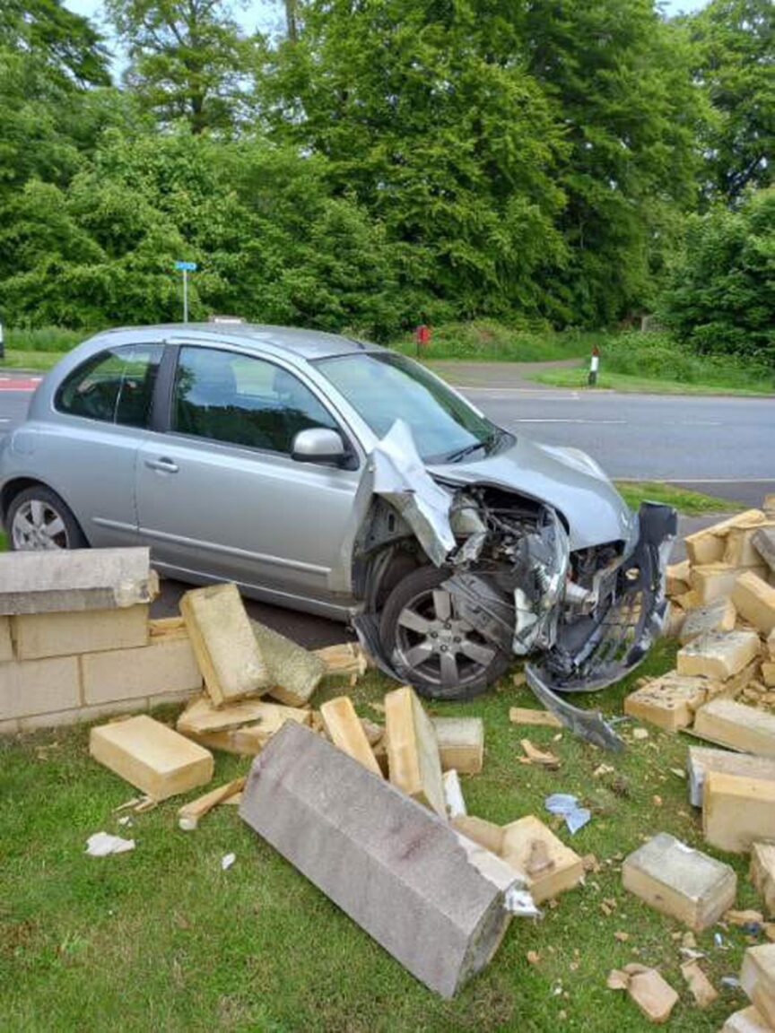 Pensioner's shock as car crashes into Dundee garden wall