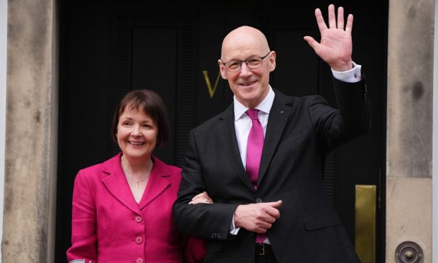 John Swinney, with his wife Elizabeth Quigley. Image: PA.