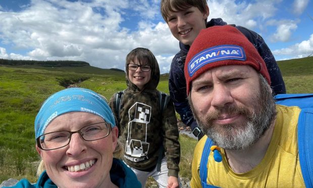 Ben Finch and Nic Crossley with children Benny, 10, and Sully, 12,