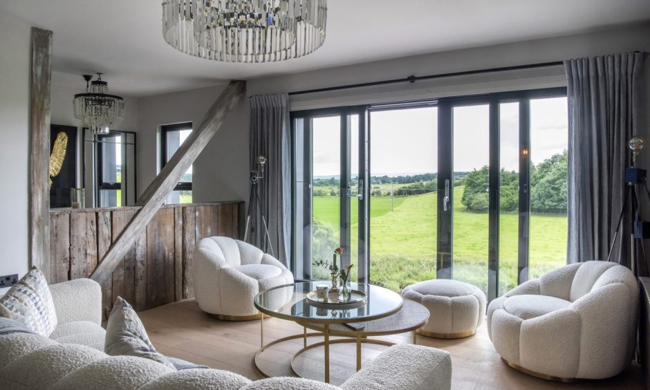 The master bedroom has its own living room with views over the Allan Water.
