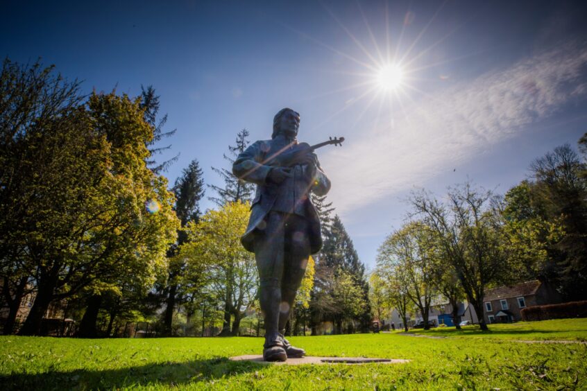 Niel Gow statue in park at Birnam and Dunkeld