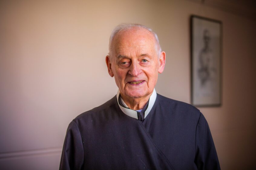 A head and shoulders shot of Father James MacManus, a real-life exorcist based in Perth.