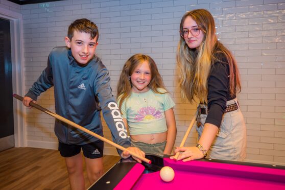 Daniel Brown (14),  Anges Brown (8) and  Rachel Brown (17) at  Hollywood Bowl. Image: Steve MacDougall/DC Thomson