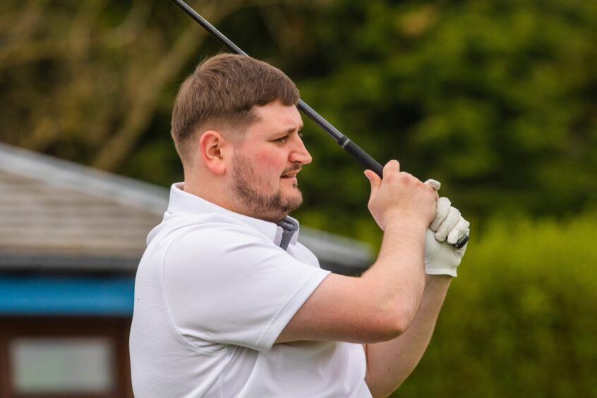 Andrew Piekorshi of Team Dingbro on the tee at the Brechin Golf Club Rotary day for MND Scotland.