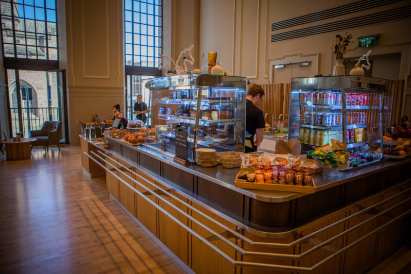 Perth Museum cafe interior, showing serving counter with cakes and soft drinks