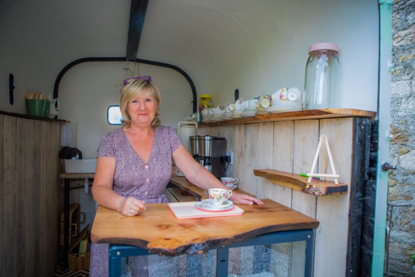 Sandra in her converted horsebox.