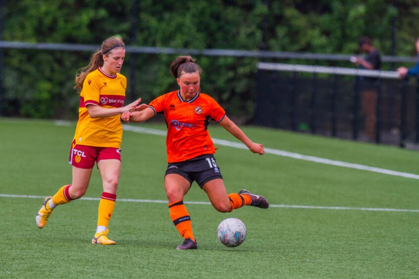 Dundee United's Leah Sidey whips in a delivery against Motherwel