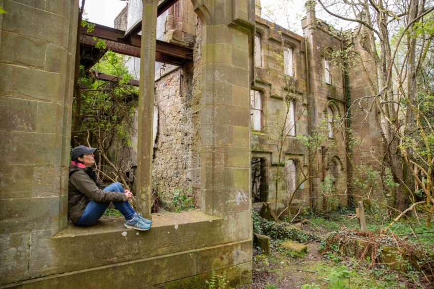 Gayle explores derelict Crawford Priory. Image: Steve Brown/DC Thomson.