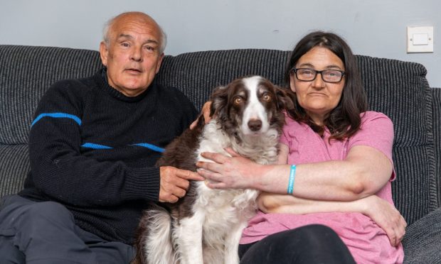 Rod Stoddart and daughter Gemma, with therapy dog Clova.