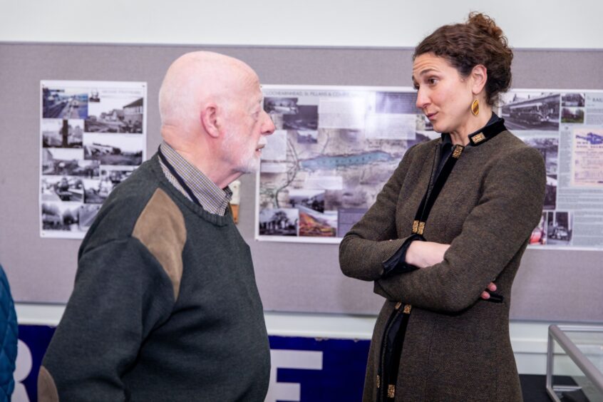 Shoshana Stewart talking to older man at Crieff Museum