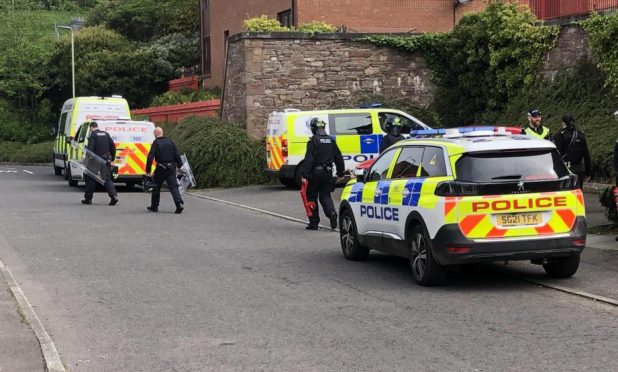Police at an incident on Eastwell Road in Dundee. Image: James Simpson/DC Thomson