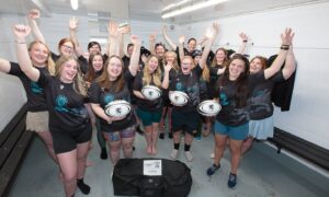 Strathmore ladies rugby team celebrate having their own dedicated changing room. Image: ASM Media