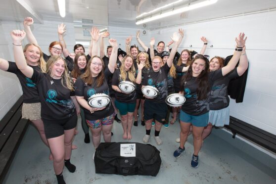 Strathmore ladies rugby team celebrate having their own dedicated changing room. Image: ASM Media