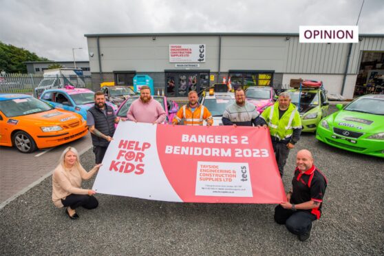 Gary Rooney and others who drove Bangers to Benidorm for Help for Kids. Image: Steve MacDougall/DC Thomson
