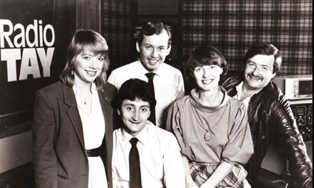 Sally Masterson, Tony Donald, Norma Gamble, Ally Bally and Kenny Page in the Radio Tay offices.