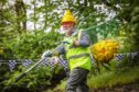 Duck catcher extraordinaire Chris Erskine scoops up the field. Image: Mhairi Edwards/DC Thomson