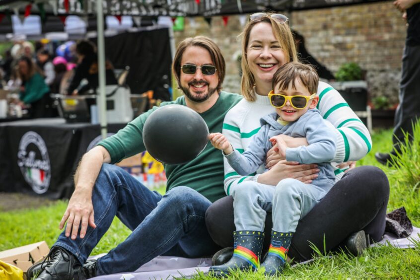 A family at Barry Mill duck races.