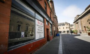 Empty building with 'to let' sign in Perth city centre
