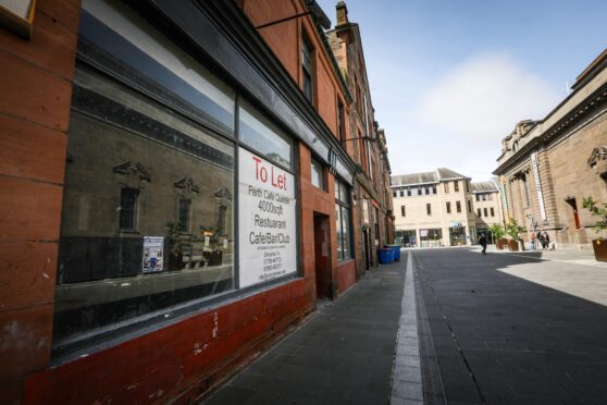 Empty building with 'to let' sign in Perth city centre