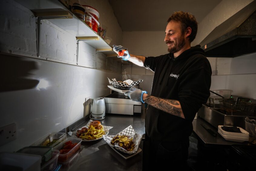 Jamie Garland adding some seasoning to his dishes at Kombo in Monifieth.