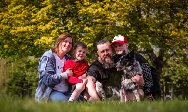 Steven Hill with his family, Ryan, 6, wife Zara, dog Skye and George, 10.