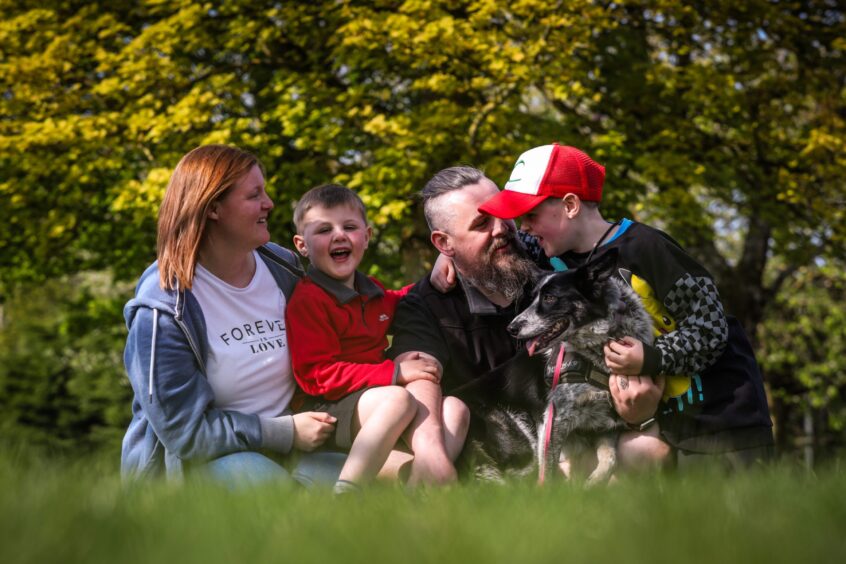  Dundee dad Steven, who has MS, with his family, Ryan, 6, wife Zara, dog Skye and George, 10