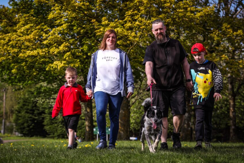 Dundee dad Steven, who has MS, enjoys going for walks with his family and their dog Skye.