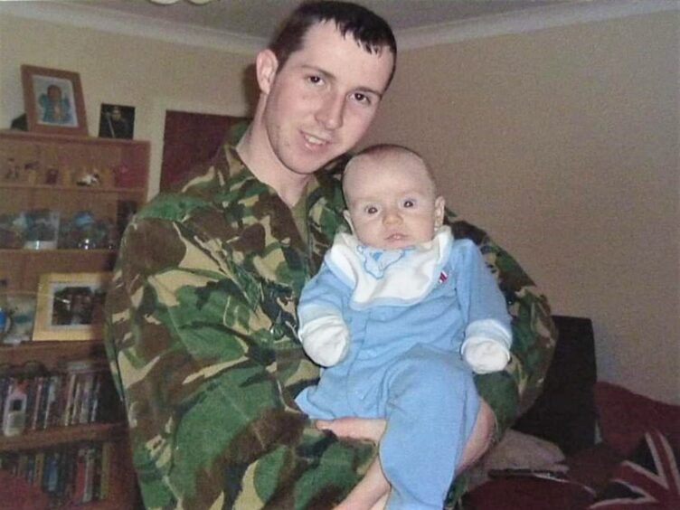  Fife dad Andrew pictured with his son Craig.