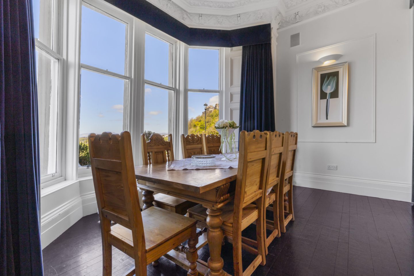 A dining table in the living room.