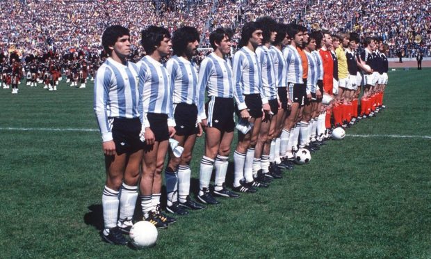 Maradona lines up with his Argentina side against Scotland.